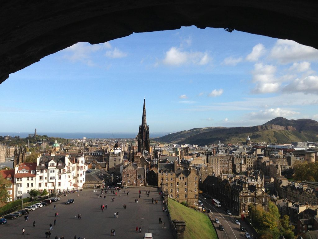 Breathtaking view of Edinburgh cityscape from the castle, highlighting historic architecture.