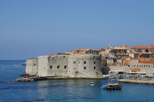 A stunning view of Dubrovnik's Old Town with its iconic medieval architecture by the Adriatic Sea.