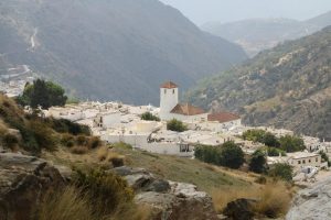 Beautiful view of Capileira village nestled in the Sierra Nevada mountains, Andalusia.