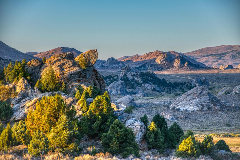 Captivating view of rocky terrain and lush greenery in Elba, Idaho during daylight.