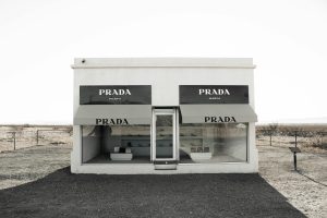 Capture of the famous Prada Marfa installation in the Texas desert, showcasing its minimalist design.