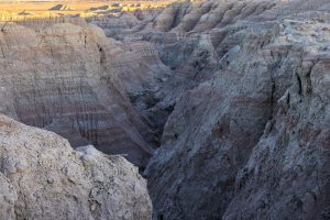 Explore the dramatic geological formations of Badlands National Park, USA.