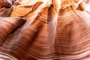Explore the intricate sandstone formations and textures in Arizona's famous Antelope Canyon.