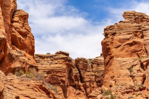 Explore the stunning rock formations of a desert canyon in Arizona, showcasing intricate erosion patterns and vibrant colors.