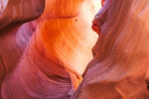 Explore the vibrant textures and colors of Antelope Canyon's sandstone walls in Arizona.