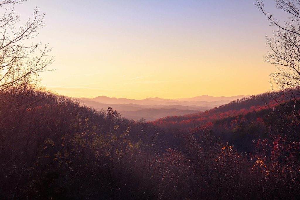 Stunning sunrise view over Gatlinburg's autumn landscape in the Smoky Mountains.