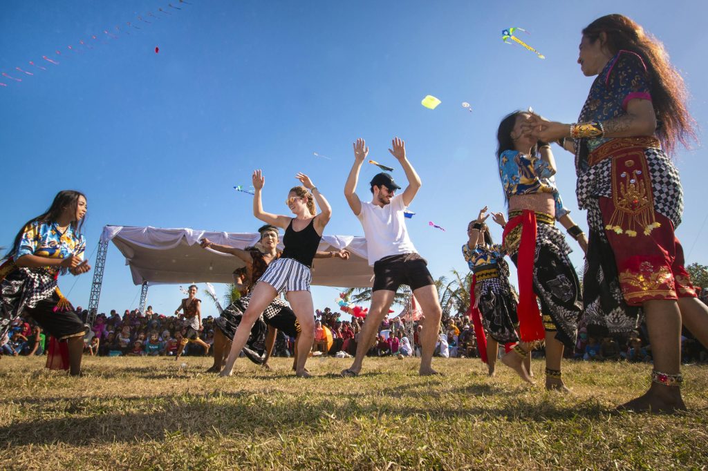 Vibrant cultural dance festival in West Java, highlighting diverse traditions and joyful community interaction.