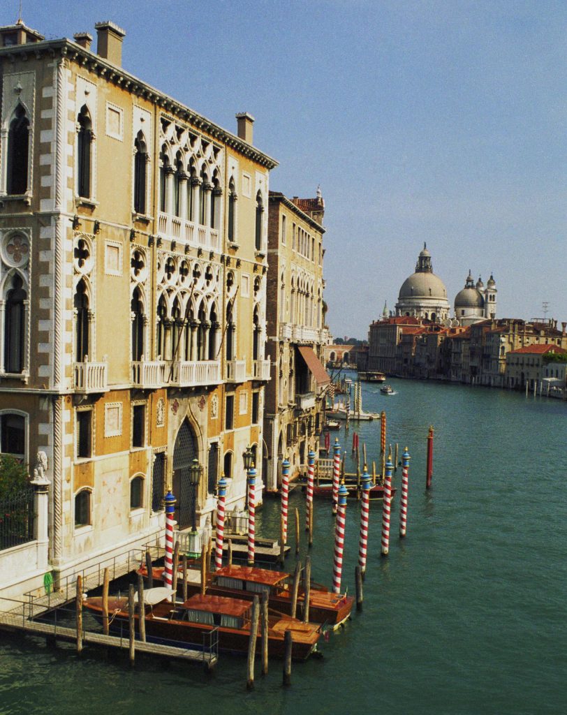 Vibrant view of Venice's Grand Canal and historic Venetian architecture.