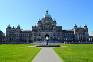 Stunning view of the British Columbia Parliament Building with clear blue sky.